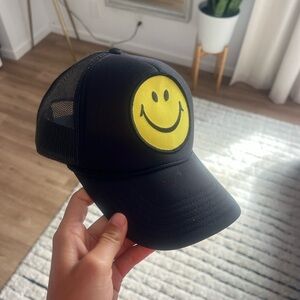 Aviator nation black smiley trucker hat
